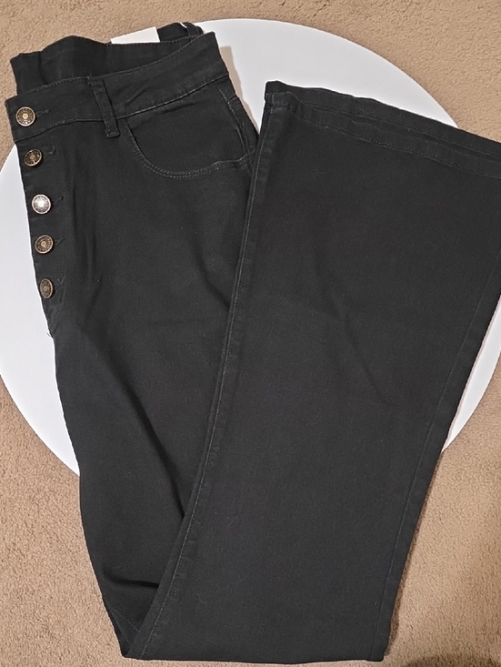 Fashion . Denim - High-Rise Black Flare Jeans with Side Button Detail